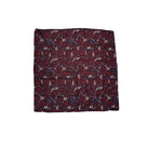 Paisley patterned fabric square on a white background