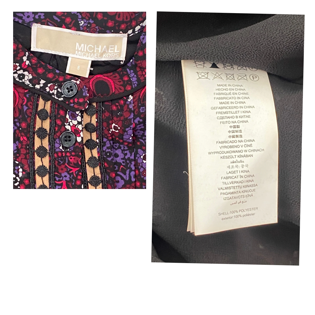 Close-up of a clothing tag with 'Michael' brand name and text on a garment.