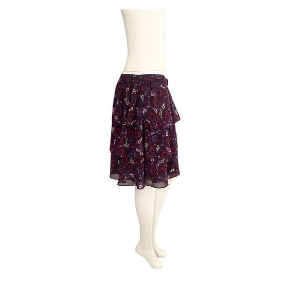 Paisley patterned skirt on a mannequin against a white background