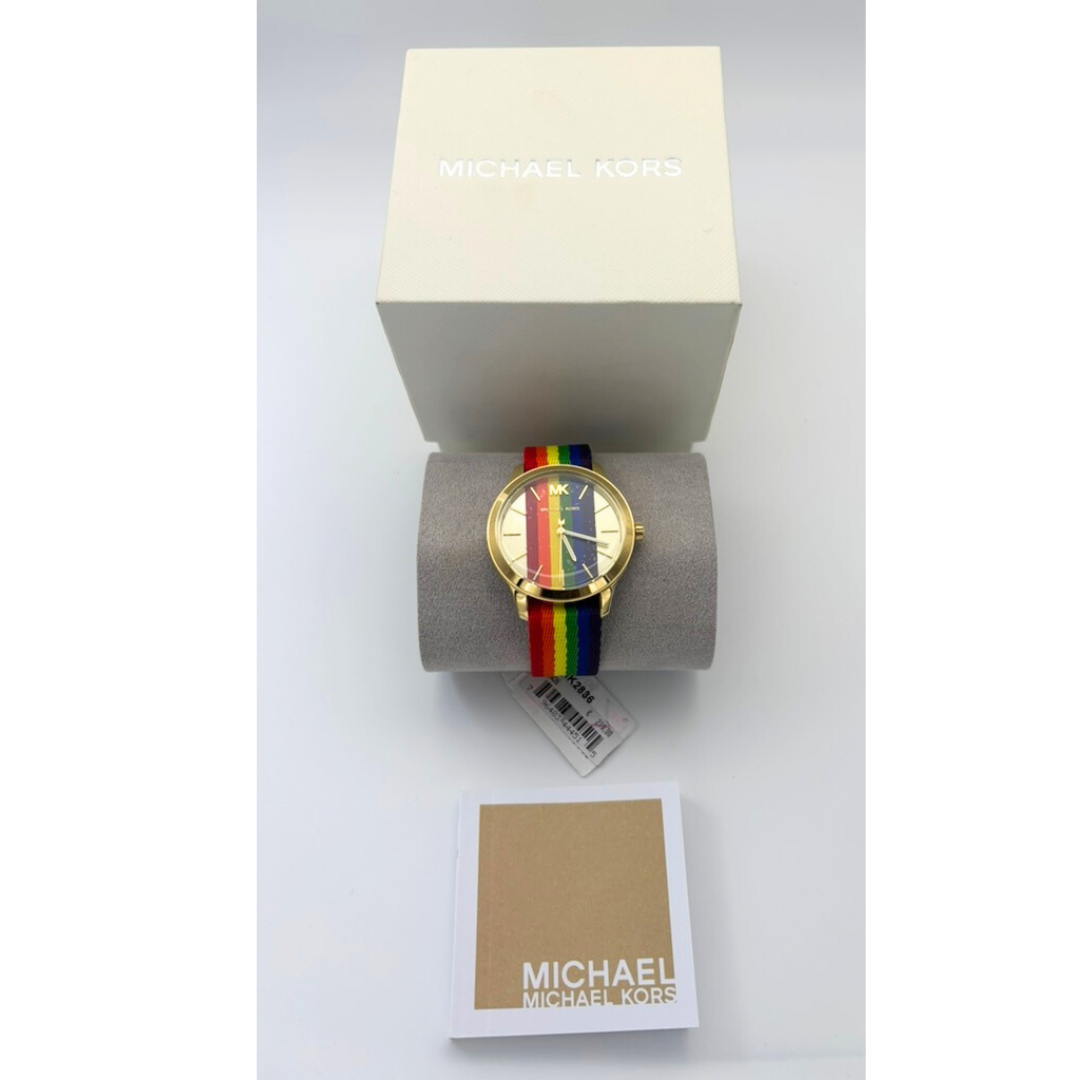 Michael Kors watch with rainbow strap on a white background