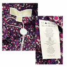 Floral-patterned garment with a Michael Kors tag and care label.