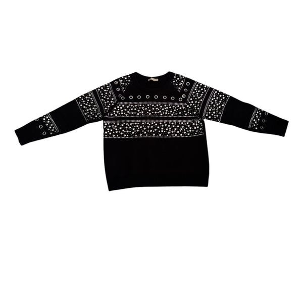 Black sweater with white pattern on a white background