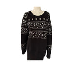 Black sweater with silver embellishments on a mannequin against a white background