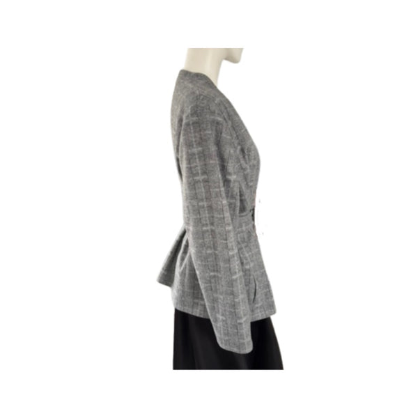 Mannequin wearing a gray textured jacket on a white background
