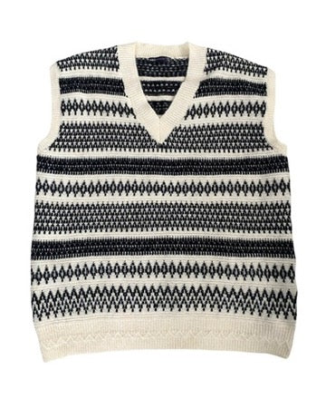 Black and white patterned sleeveless sweater vest on a white background