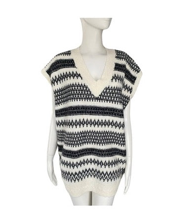 Black and white patterned sleeveless top on a mannequin against a white background