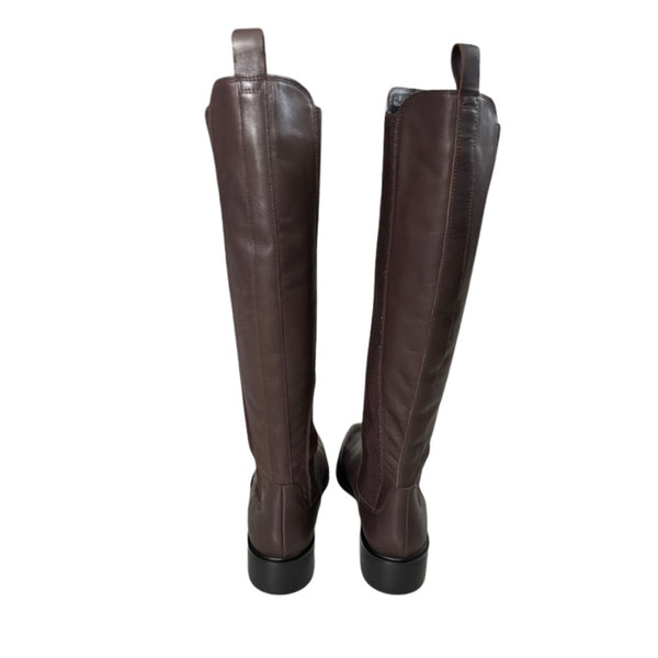 Pair of brown knee-high boots on a white background