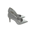 Silver glitter high-heeled shoes on a white background