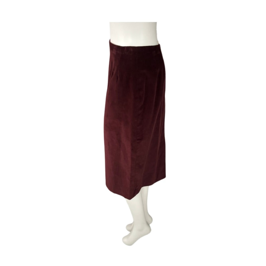 Burgundy skirt on a mannequin against a white background