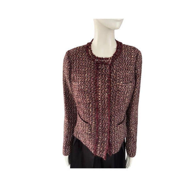 Textured cardigan on a mannequin against a white background