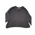 Knitted sweater with cut-out shoulders on a white background