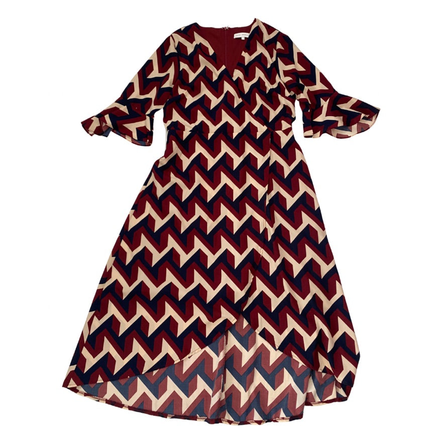 Chevron patterned dress on a white background