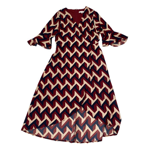 Chevron patterned dress on a white background