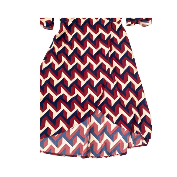 Dress with red and blue zigzag pattern on a white background