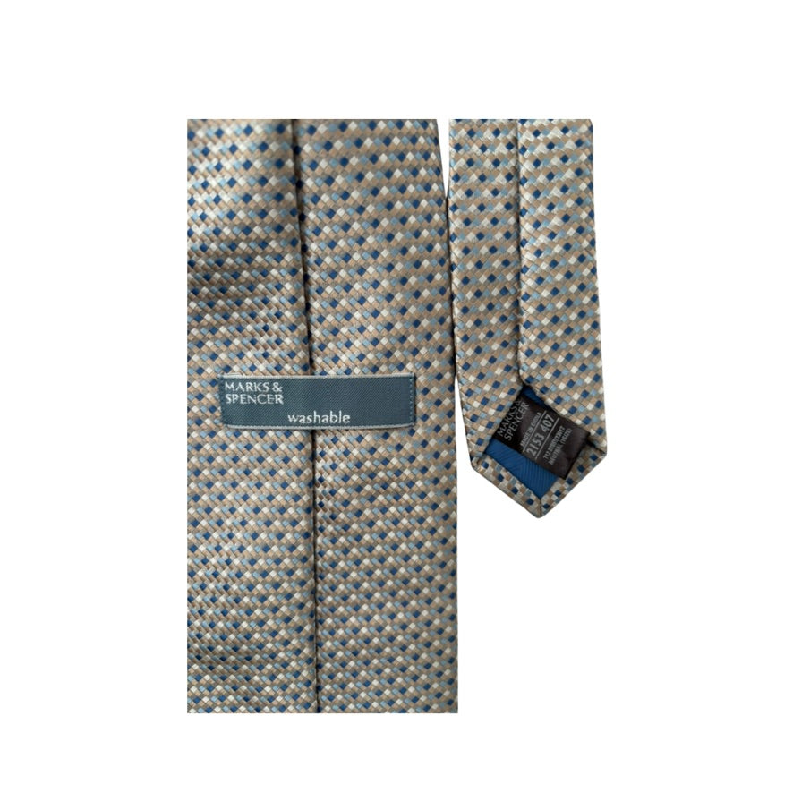 Patterned tie with brand label on a white background