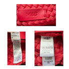 Red woven bag with M&S label and care instructions on a white background