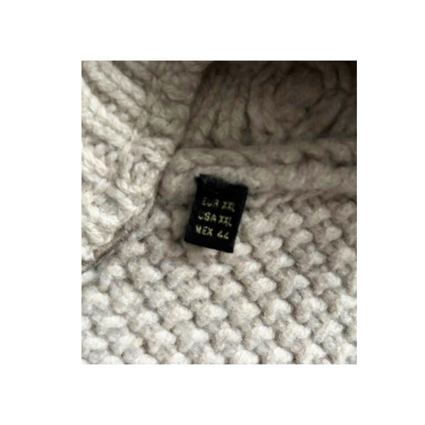 Close-up of a textured fabric with a label on a white background