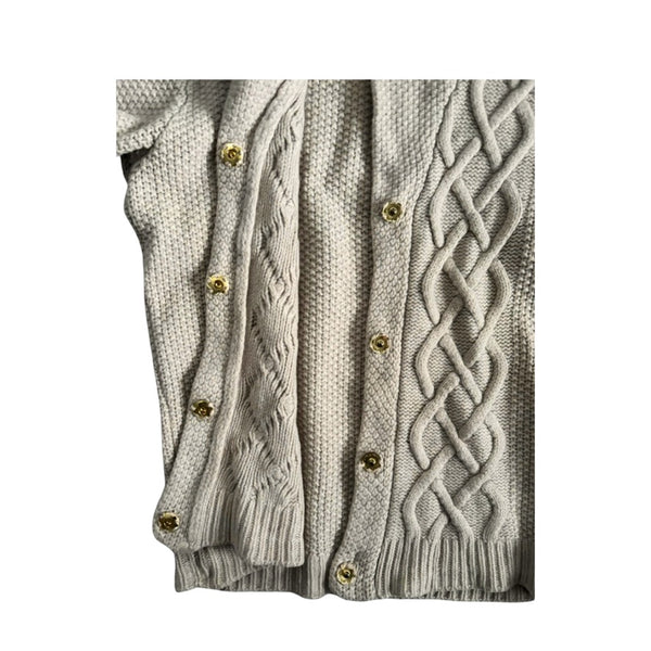 Beige cable knit cardigan with gold buttons on a white background