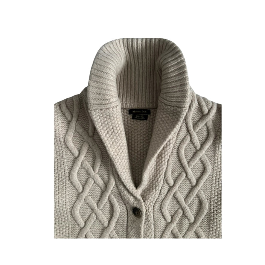 Knitted cardigan with cable pattern on a white background