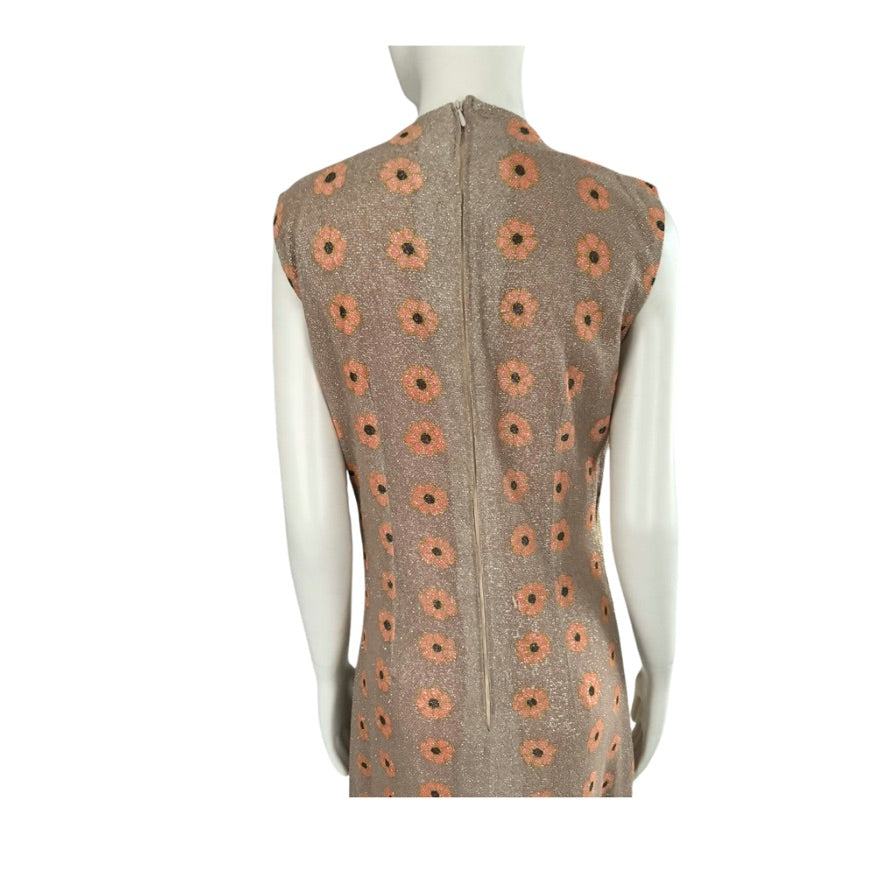 Sleeveless brown garment with orange floral patterns on a white background