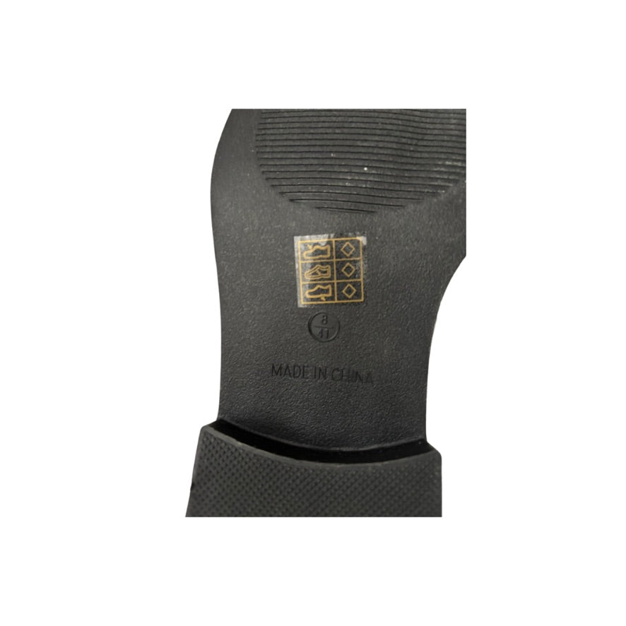 Black rubber grip with gold logo and 'Made in China' text on a white background