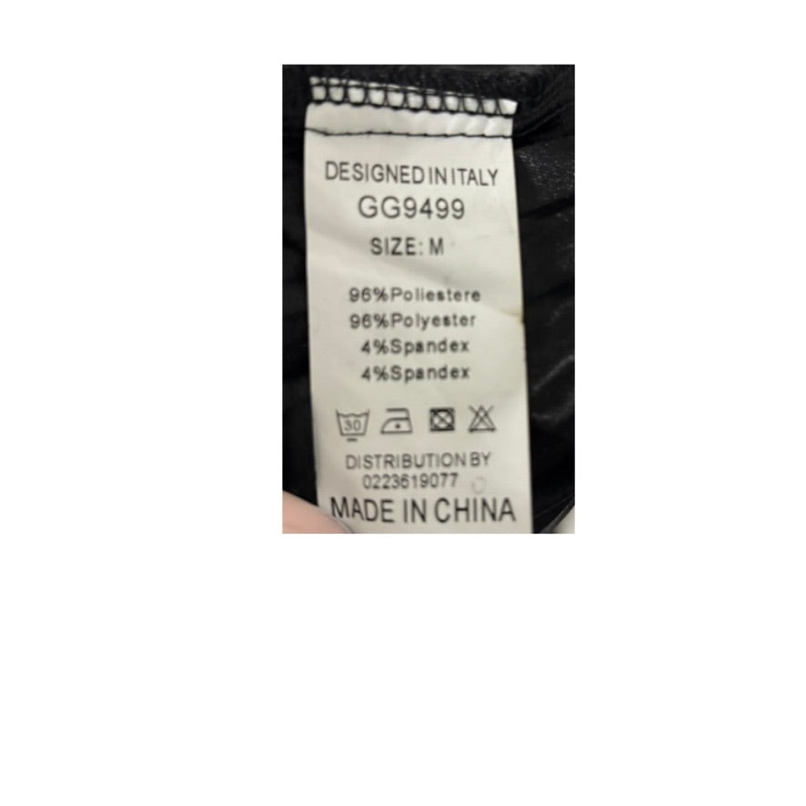 Clothing label with text and symbols on a white background