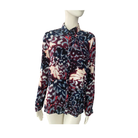 Mannequin wearing a patterned shirt on a white background