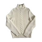 Beige turtleneck sweater with cable knit pattern on a white background