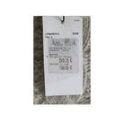 Clothing tag with price and size information on a textured fabric background