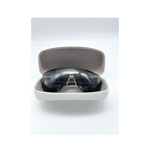 Sunglasses in an open case on a white background