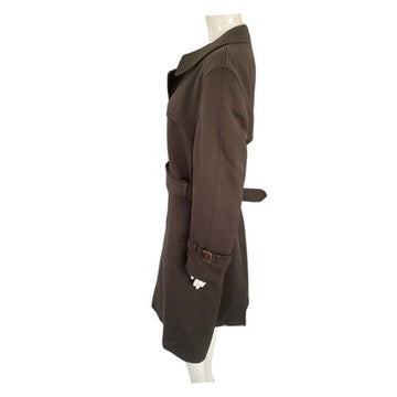 Brown coat on a mannequin against a white background