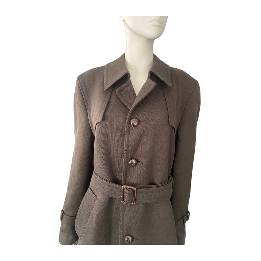 Brown coat on a mannequin against a white background