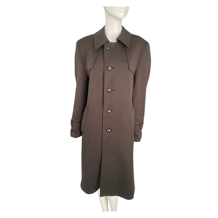 Brown coat on a mannequin against a white background