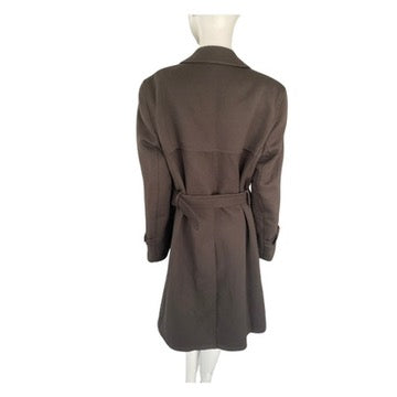 Brown coat on a mannequin against a white background