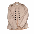 Pale pink  jacket with black buttons on a white background