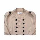 Pale pink jacket with black buttons on a white background