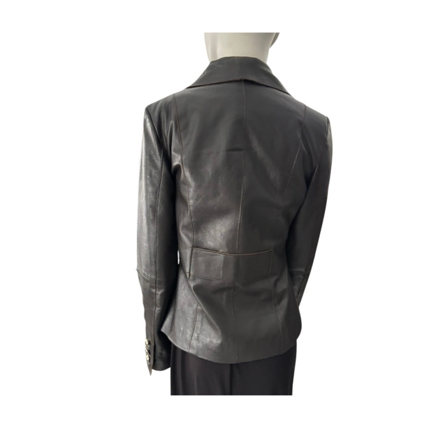 Brown leather jacket on a mannequin against a white background