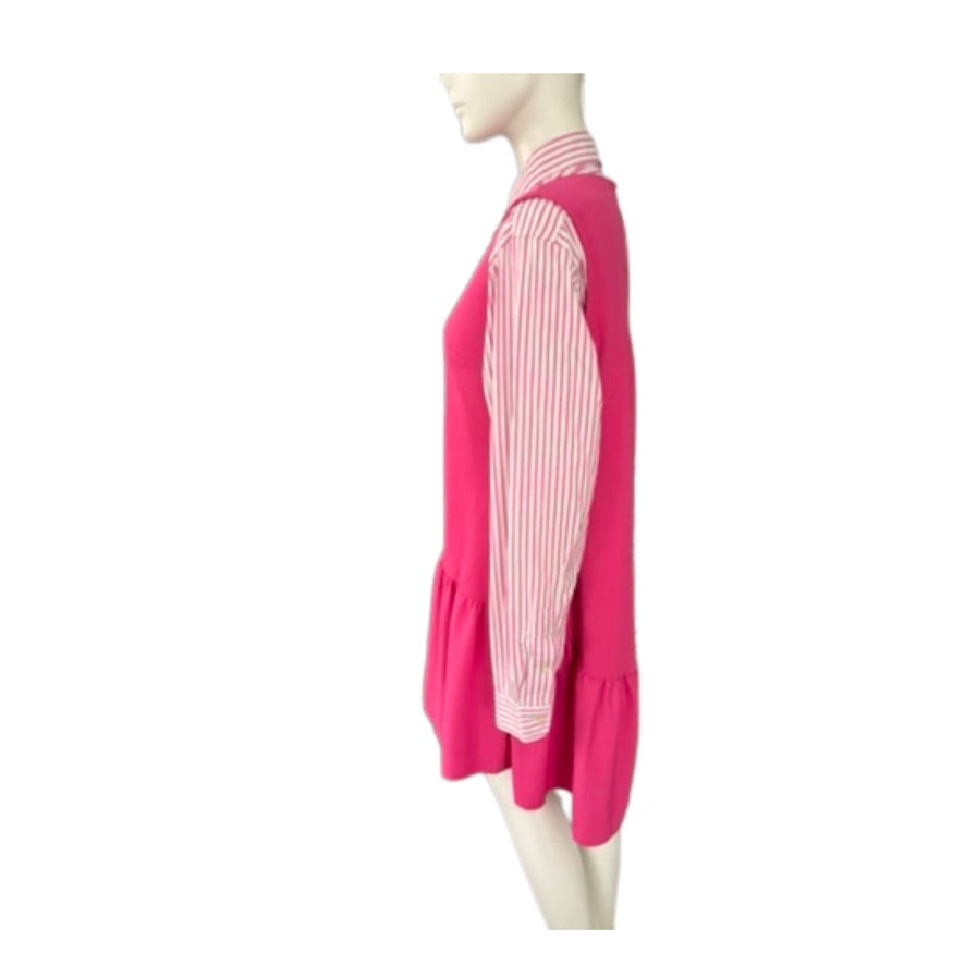 Mannequin wearing a pink dress with a striped pattern on a white background