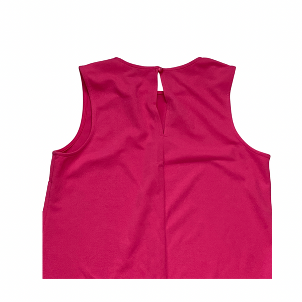 Pink sleeveless top on a white background