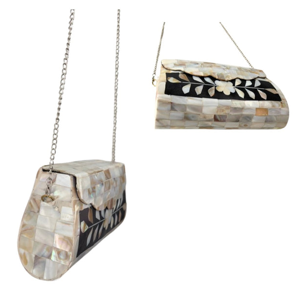 Two handbags with shell-like patterns on a white background