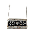 Clutch bag with floral design on a white background