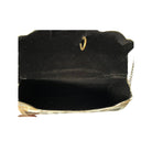 Black clutch bag with gold chain on a white background