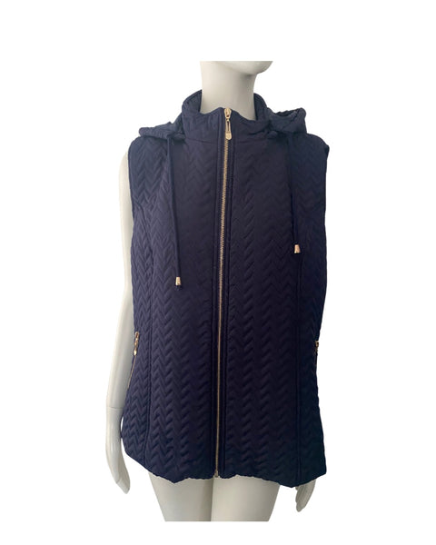 Navy quilted vest with a hood on a mannequin against a white background