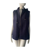 Navy blue quilted vest on a mannequin against a white background