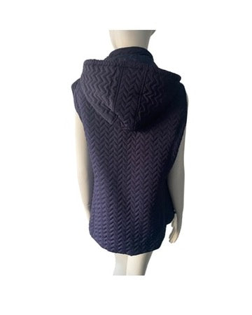 Navy blue quilted vest on a mannequin against a white background