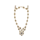 Gold necklace with gemstones on a white background