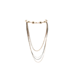 Necklace with multiple strands on a white background