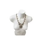 Necklace displayed on a white mannequin bust against a white background