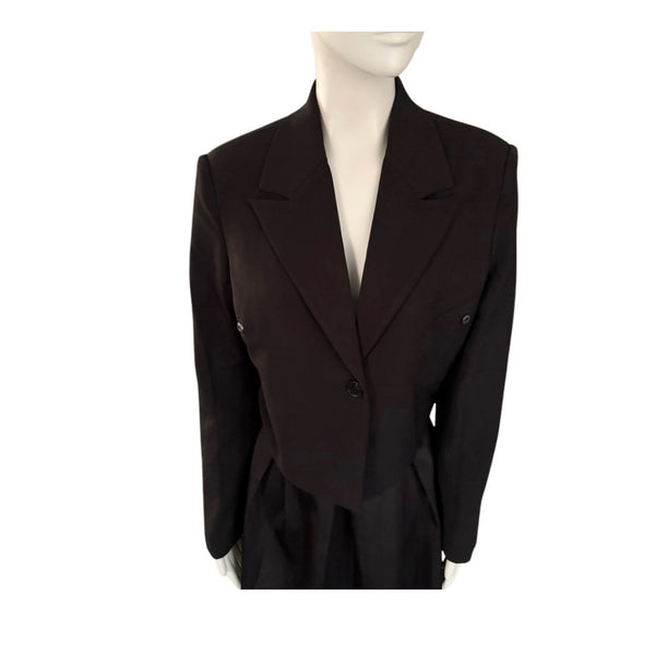 Black blazer on a mannequin against a white background