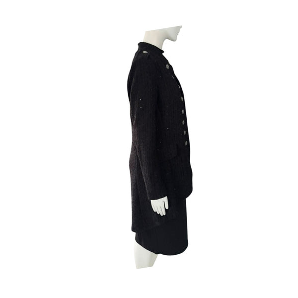 Black coat on a mannequin against a white background